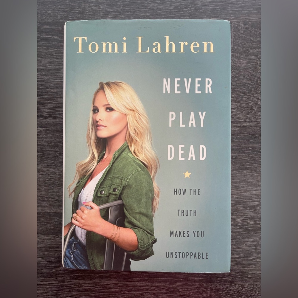 Never Play Dead Book by Tomi Lahren